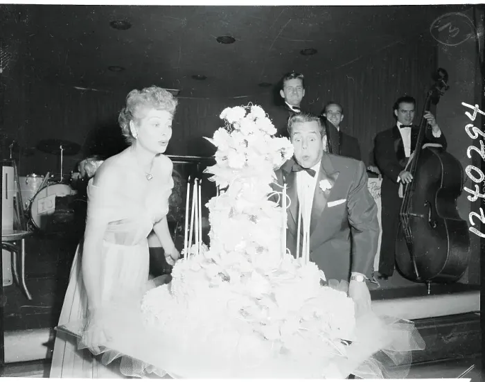 Framed Print : Lucille Ball and Desi Arnaz Sharing Anniversary Celebration