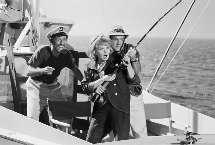 Framed Print : Lucille Ball Holding a Fishing Pole Framed Print : Lucille Ball Holding a Fishing Pole