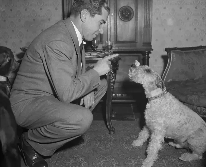 Framed Print : Lucky Luciano Teaching Dog a Trick Framed Print : Lucky Luciano Teaching Dog a Trick