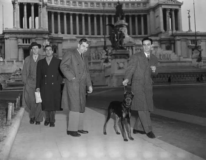 Framed Print : Lucky Luciano Walking with Doberman Pincer Framed Print : Lucky Luciano Walking with Doberman Pincer