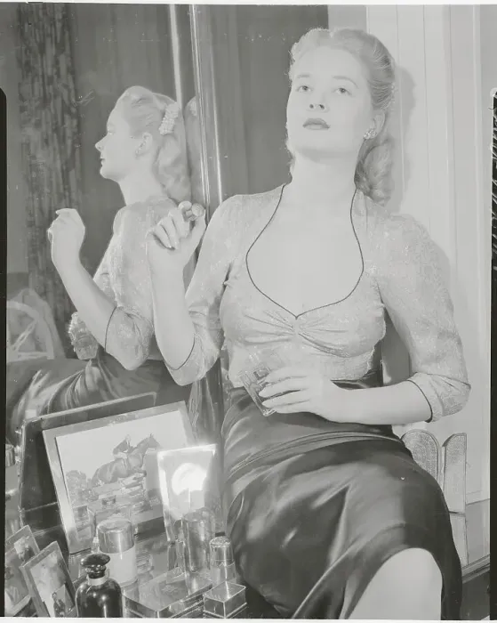 Framed Print : Lucy Cochrane Putting on Perfume