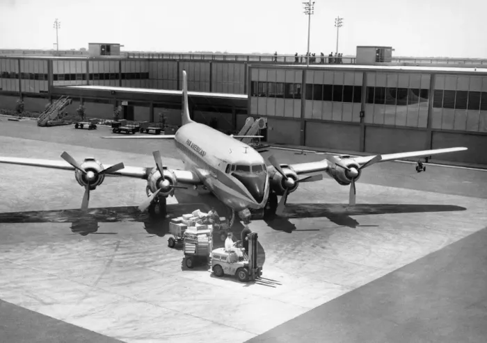 Framed Print : Luggage being unloaded from airplane Framed Print : Luggage being unloaded from airplane