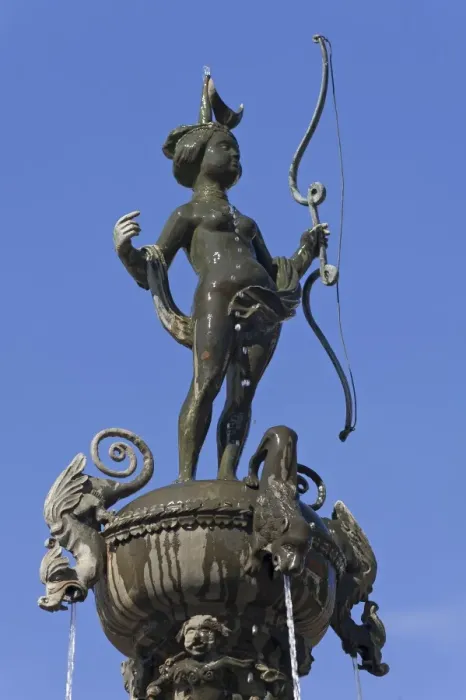 Framed Print : Luna sculpture on the Luna Fountain, 1530, against blue sky, market square, Luneburg, Lower Saxony, Germany Framed Print : Luna sculpture on the Luna Fountain, 1530, against blue sky, market square, Luneburg, Lower Saxony, Germany