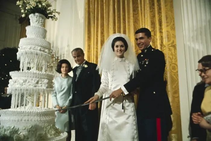 Framed Print : Lyndon Johnson and Wife Watching Daughter Cut Wedding Cake Framed Print : Lyndon Johnson and Wife Watching Daughter Cut Wedding Cake