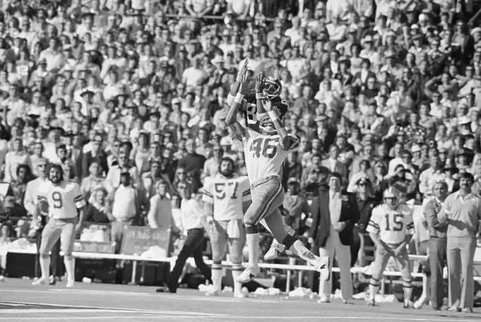 Framed Print : Lynn Swann and Mark Washington Leaping for Football Framed Print : Lynn Swann and Mark Washington Leaping for Football