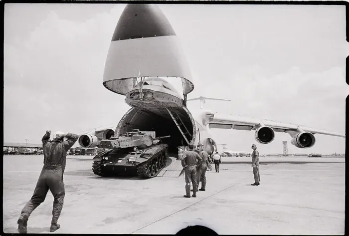 Framed Print : M-41 Tank Is Unloaded From Cargo Plane Framed Print : M-41 Tank Is Unloaded From Cargo Plane