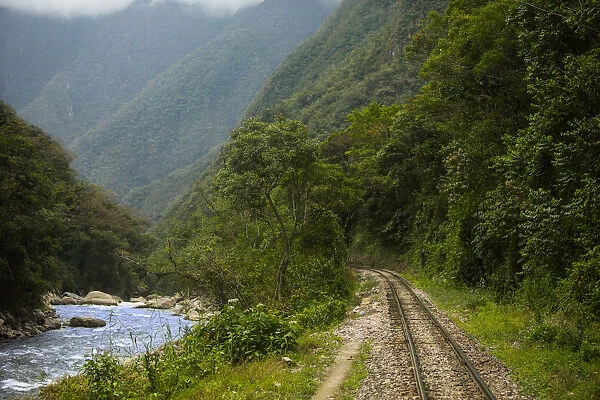 Machu Picchu-Cusco Railway running along Urubamba River, Cusco Region, Peru