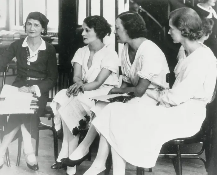Framed Print : Mademoiselle Chanel Conversing with Her Employees Framed Print : Mademoiselle Chanel Conversing with Her Employees