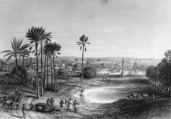 Madras. circa 1785: A group of travellers stop at a lake in the city of