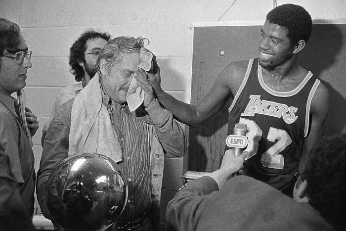 Framed Print : Magic Johnson Wiping Jerry Buss's Forehead Framed Print : Magic Johnson Wiping Jerry Buss's Forehead