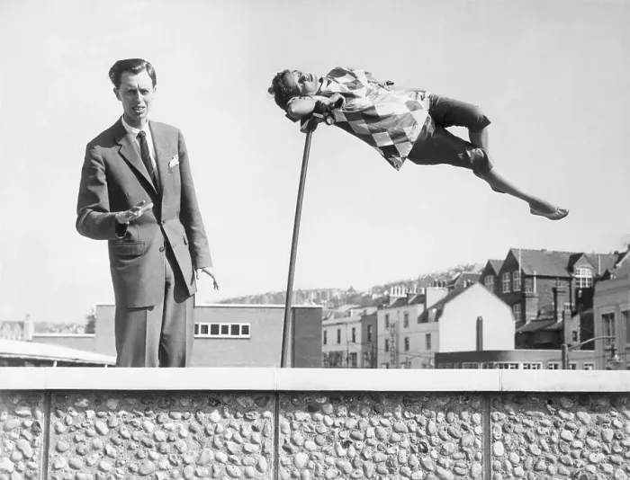 Framed Print : Magician and Assistant Performing Levitation Feat Framed Print : Magician and Assistant Performing Levitation Feat