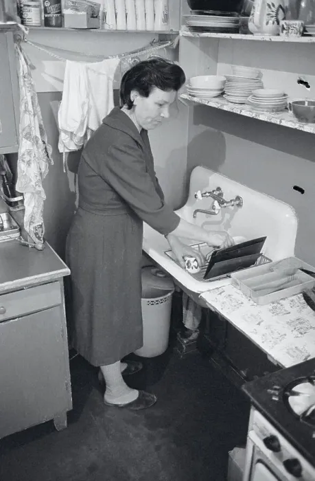 Framed Print : Maid Cleaning Dishes in Apartment