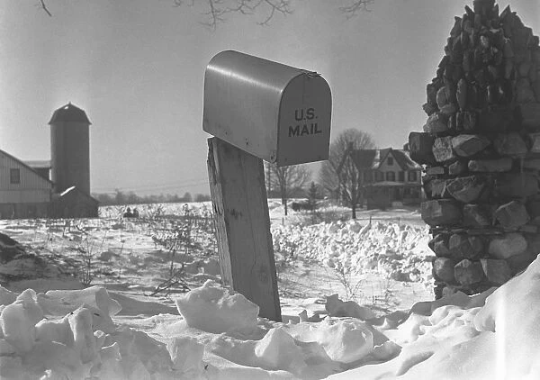 US mailbox at country road in snow, (B&W)