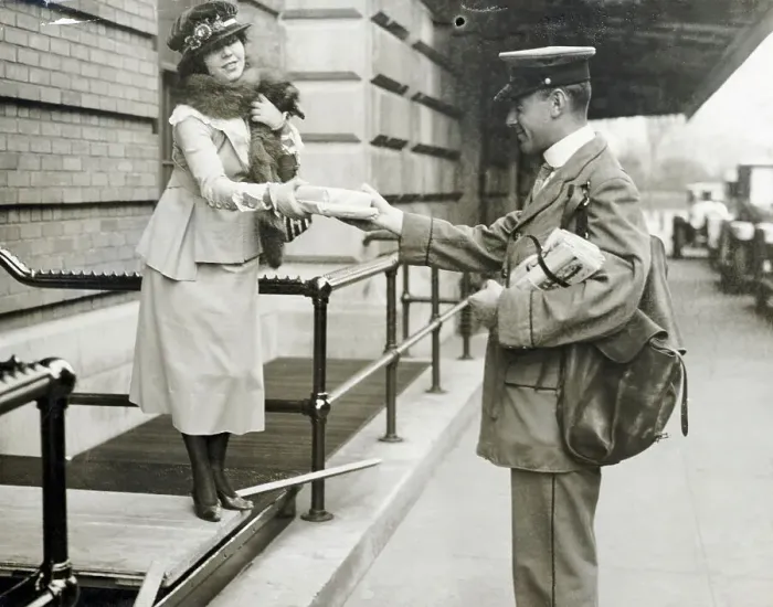 Framed Print : Mailman Delivering Packages to Woman Framed Print : Mailman Delivering Packages to Woman