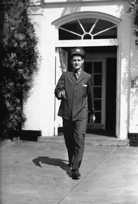 Framed Print : Mailman in front of house, (B&W) Framed Print : Mailman in front of house, (B&W)