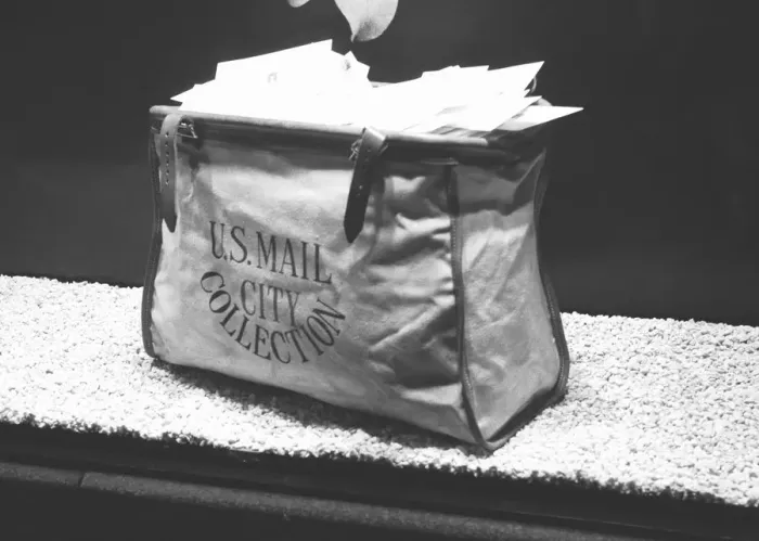 Framed Print : Mailmans bag full of letters, (B&W) Framed Print : Mailmans bag full of letters, (B&W)