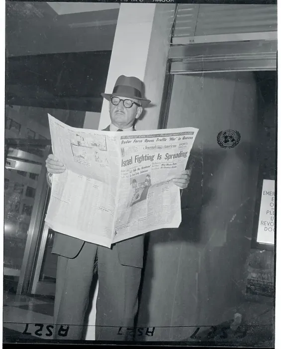 Framed Print : Major General E. L. M. Burns with Newspaper Framed Print : Major General E. L. M. Burns with Newspaper