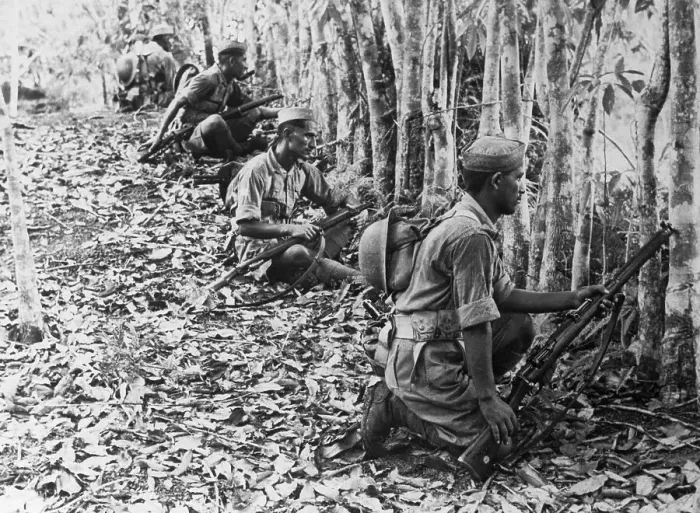 Framed Print : Malaysian Soldiers Crouched Near Trees Framed Print : Malaysian Soldiers Crouched Near Trees