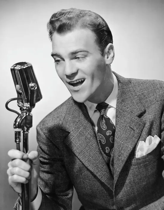 Framed Print : Male singer holding microphone Framed Print : Male singer holding microphone