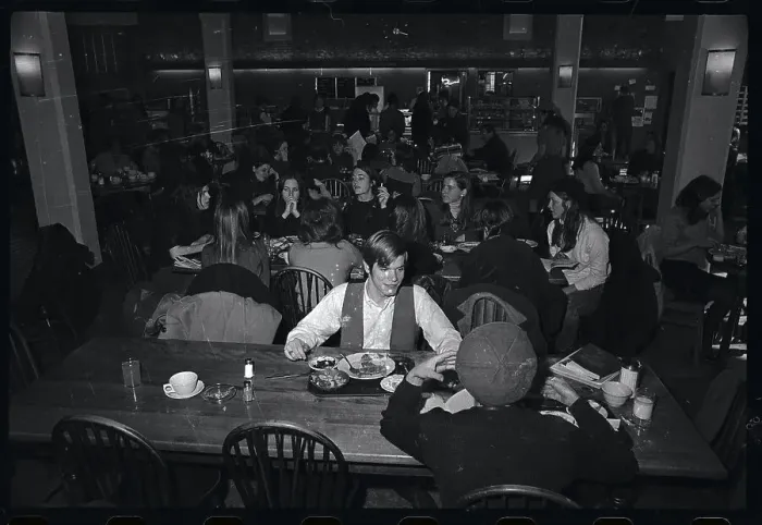 Framed Print : Male Student in Female College Cafeteria Framed Print : Male Student in Female College Cafeteria