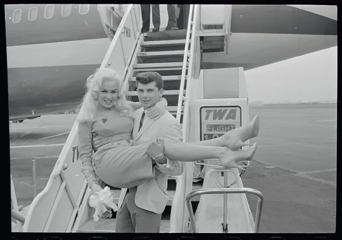 Framed Print : Mamie Van Doren Being Carried by Anthony Santoro on Airplane Steps Framed Print : Mamie Van Doren Being Carried by Anthony Santoro on Airplane Steps