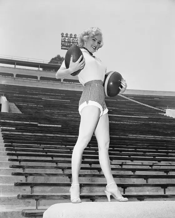 Framed Print : Mamie Van Doren Posing on Bleachers