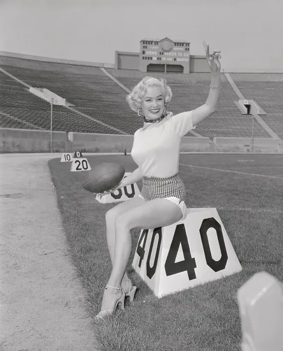 Framed Print : Mamie Van Doren Posing on Football Marker on The Field Framed Print : Mamie Van Doren Posing on Football Marker on The Field