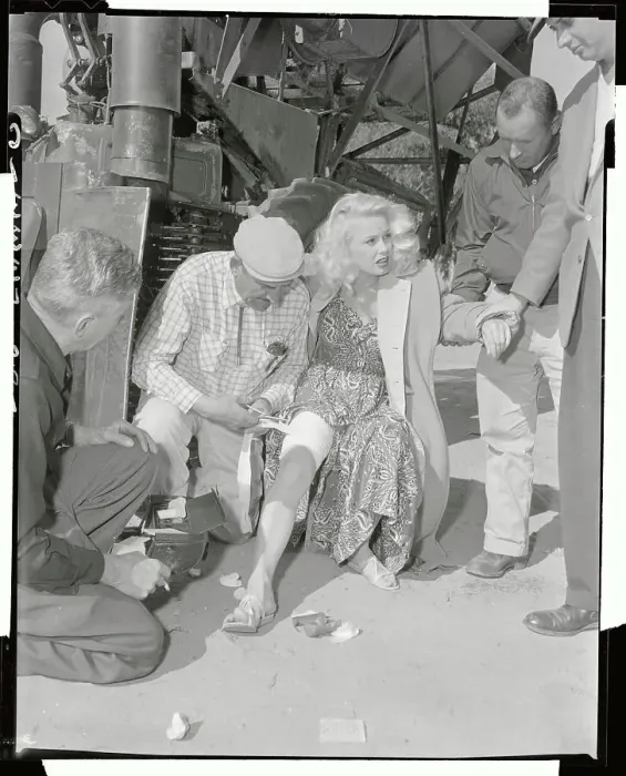 Framed Print : Mamie Van Doren Being Treated by First Aid Man
