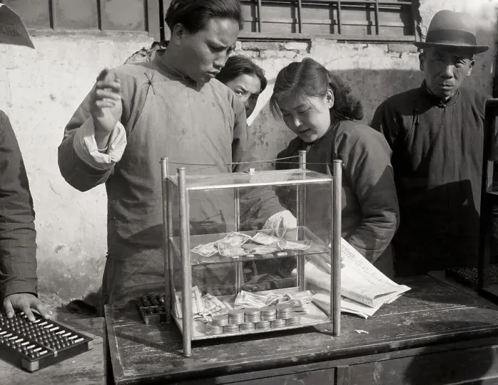 Framed Print : Man With American Currency In Glass Box