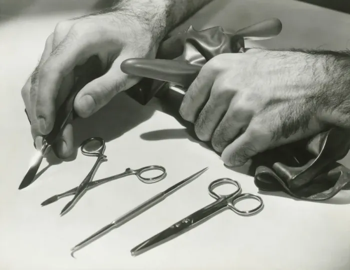 Framed Print : Man arranging surgical tools, close up of hands Framed Print : Man arranging surgical tools, close up of hands