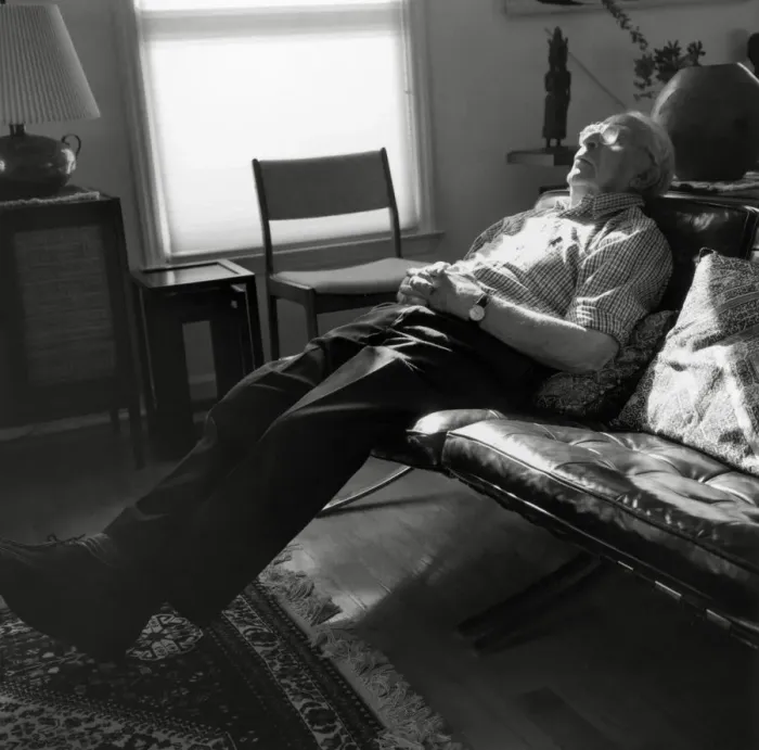 Framed Print : Man asleep on couch Framed Print : Man asleep on couch