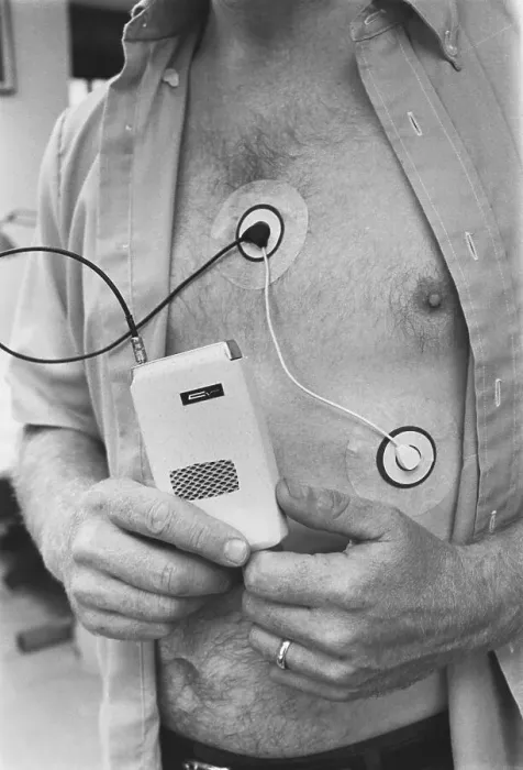 Framed Print : Man Attached and Holding to Medical Device Framed Print : Man Attached and Holding to Medical Device
