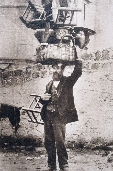 Framed Print : Man Balancing Basket and Chairs on His Head Framed Print : Man Balancing Basket and Chairs on His Head