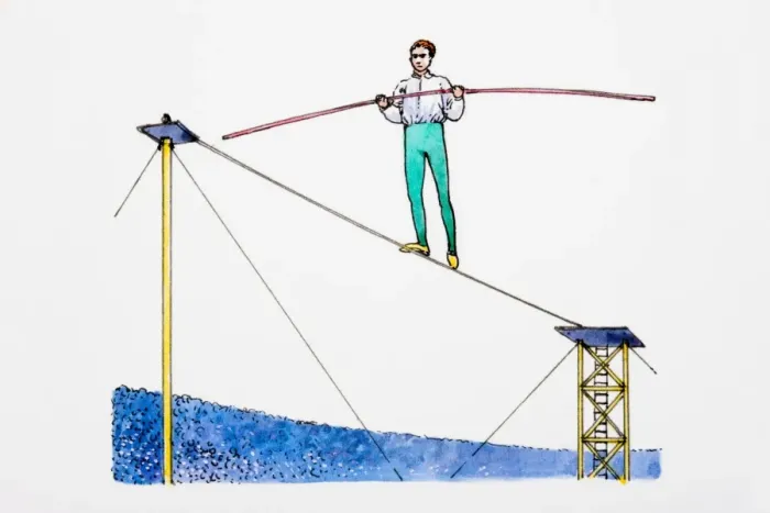Framed Print : Man balancing on tightrope Framed Print : Man balancing on tightrope