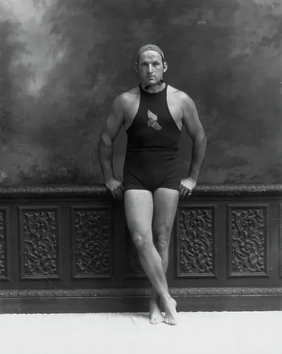 Framed Print : Man in Bathing Suit Leaning Against Wall Framed Print : Man in Bathing Suit Leaning Against Wall