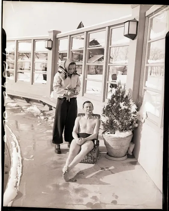 Framed Print : Man in Bathing Suit by Pool in Winter Framed Print : Man in Bathing Suit by Pool in Winter