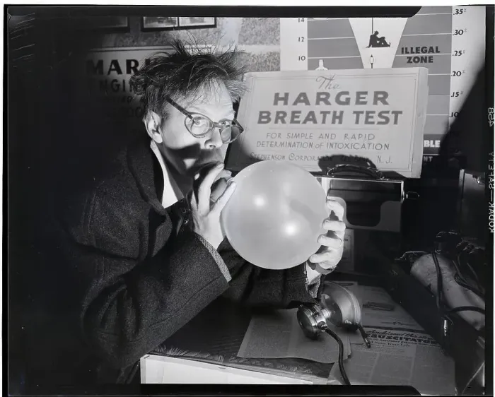 Framed Print : Man Blowing Into Balloon; Drunk Framed Print : Man Blowing Into Balloon; Drunk
