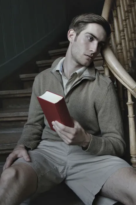 Framed Print : Man with book in a stairwell, nostalgic portrait Framed Print : Man with book in a stairwell, nostalgic portrait