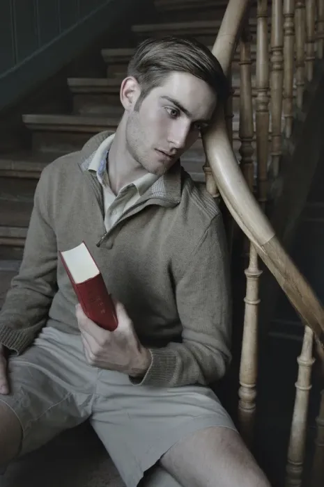 Framed Print : Man with book in a stairwell, nostalgic portrait