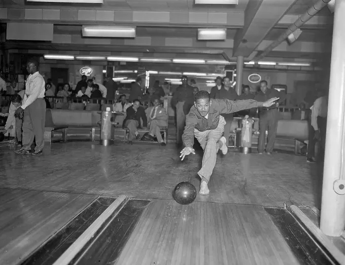 Framed Print : Man Bowling in Harlem Alley Framed Print : Man Bowling in Harlem Alley