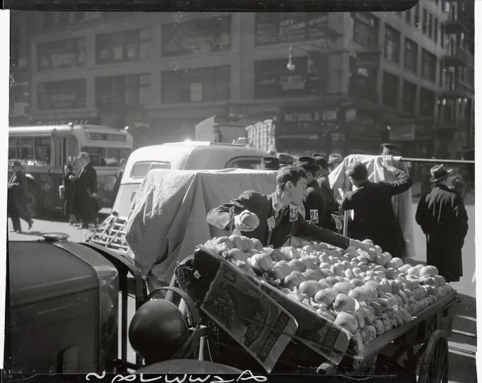 Framed Print : Man Buying Apple from the Street Framed Print : Man Buying Apple from the Street