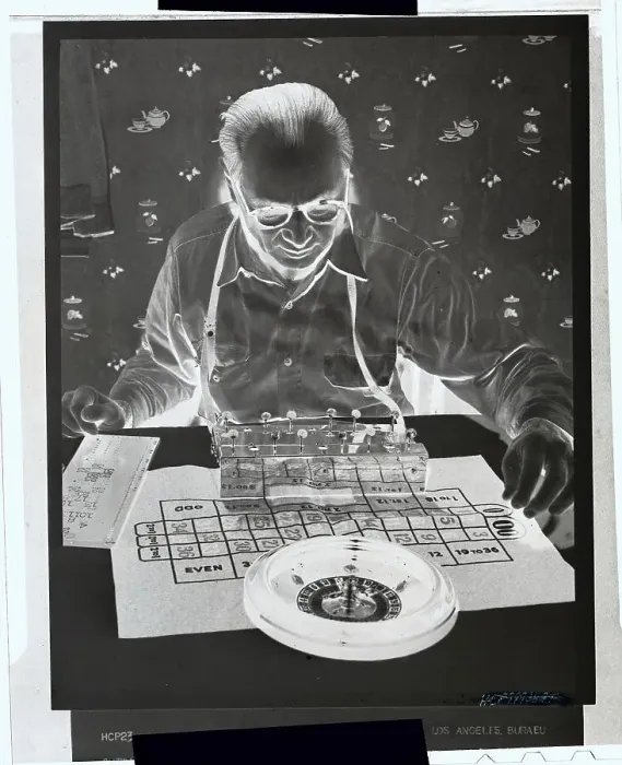 Framed Print : Man with Calculator and Roulette Wheel Framed Print : Man with Calculator and Roulette Wheel