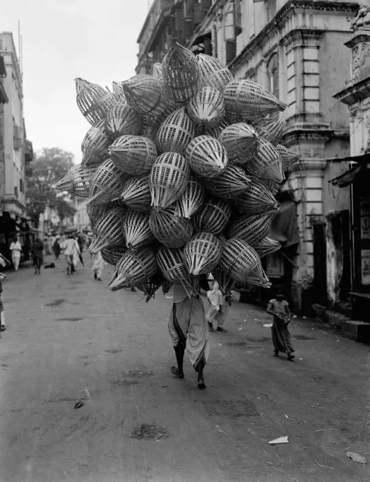 Framed Print : Man carrying baskets Framed Print : Man carrying baskets