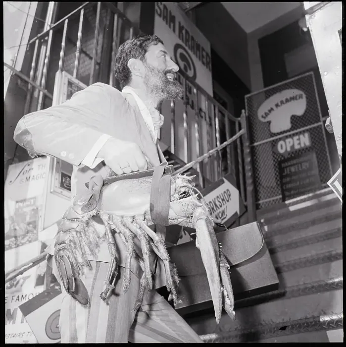 Framed Print : Man Carrying Lobster Like A Suitcase Framed Print : Man Carrying Lobster Like A Suitcase