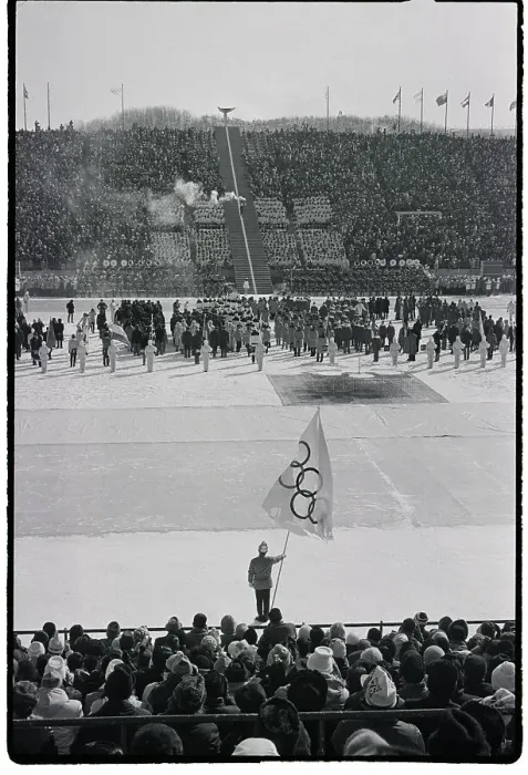 Framed Print : Man Carrying Olympic Torch Up Steps Framed Print : Man Carrying Olympic Torch Up Steps