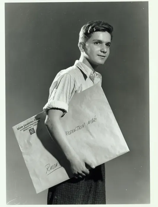Framed Print : Man Carrying Package Framed Print : Man Carrying Package