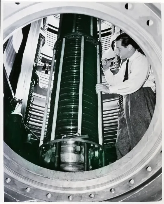 Framed Print : Man in Charge of Cyclotron Tests Tube Framed Print : Man in Charge of Cyclotron Tests Tube