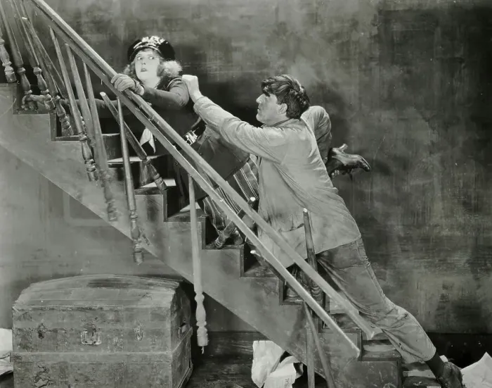 Framed Print : Man Chases Woman Up Decrepit Staircase Framed Print : Man Chases Woman Up Decrepit Staircase