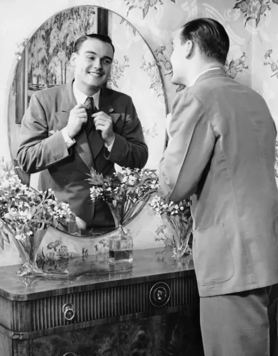 Framed Print : Man checking himself out in mirror Framed Print : Man checking himself out in mirror