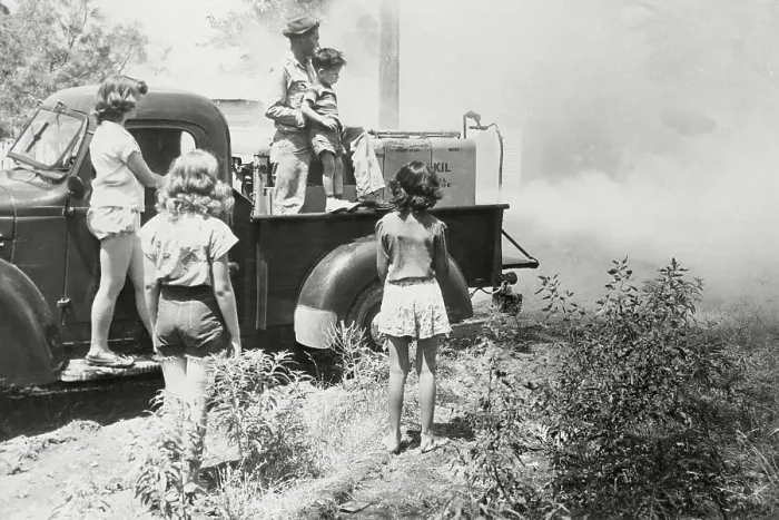 Framed Print : Man with Children Gazing at Polio Vaccine Spraying from Afar Framed Print : Man with Children Gazing at Polio Vaccine Spraying from Afar